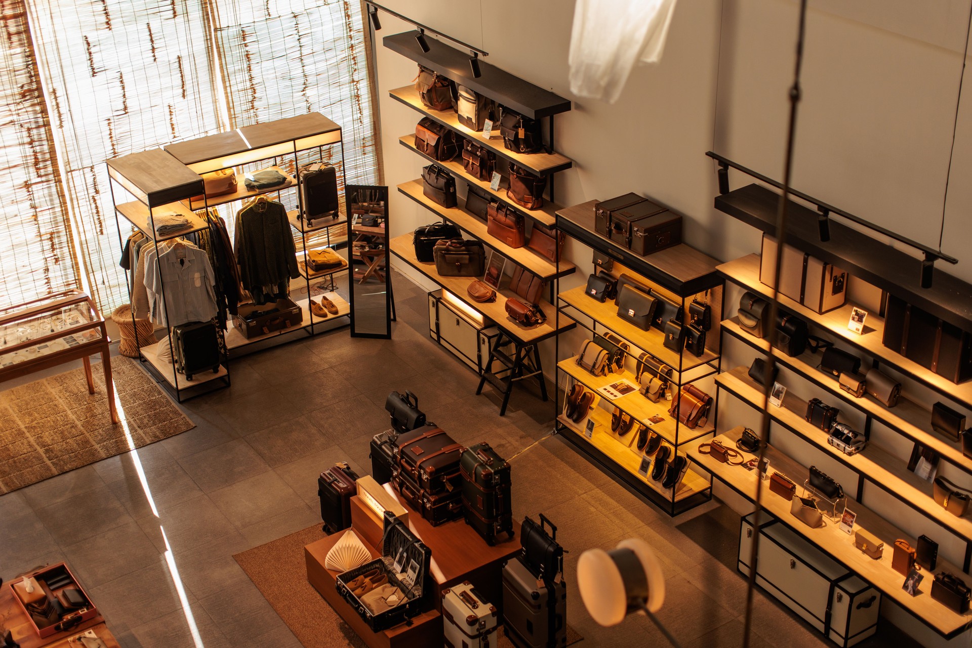 Creative team developing a brand positioning strategy with marketing visuals and retail product displays.